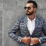 portrait-handsome-fashion-businessman-model-dressed-elegant-checkered-suit_158538-14200